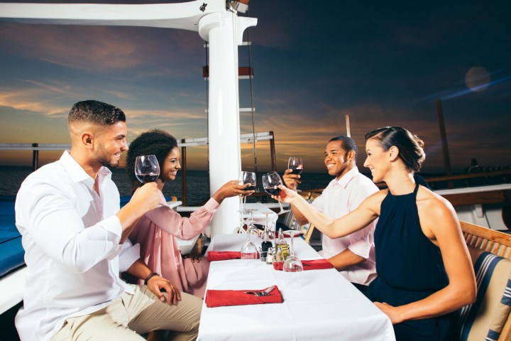 a group of people sitting at a table